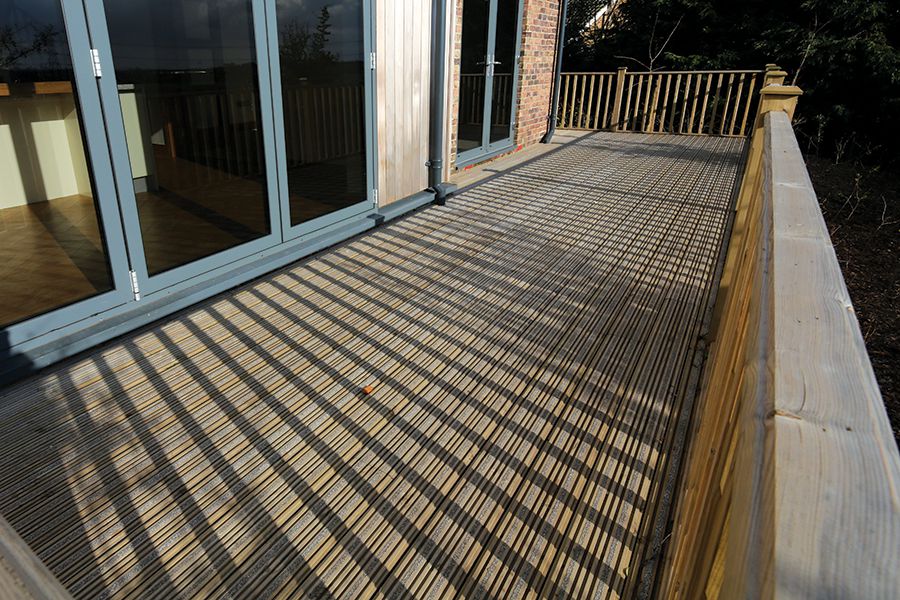 Deck area using Two Strip Grooved Deck Boards