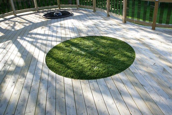 Grass cut into decking area