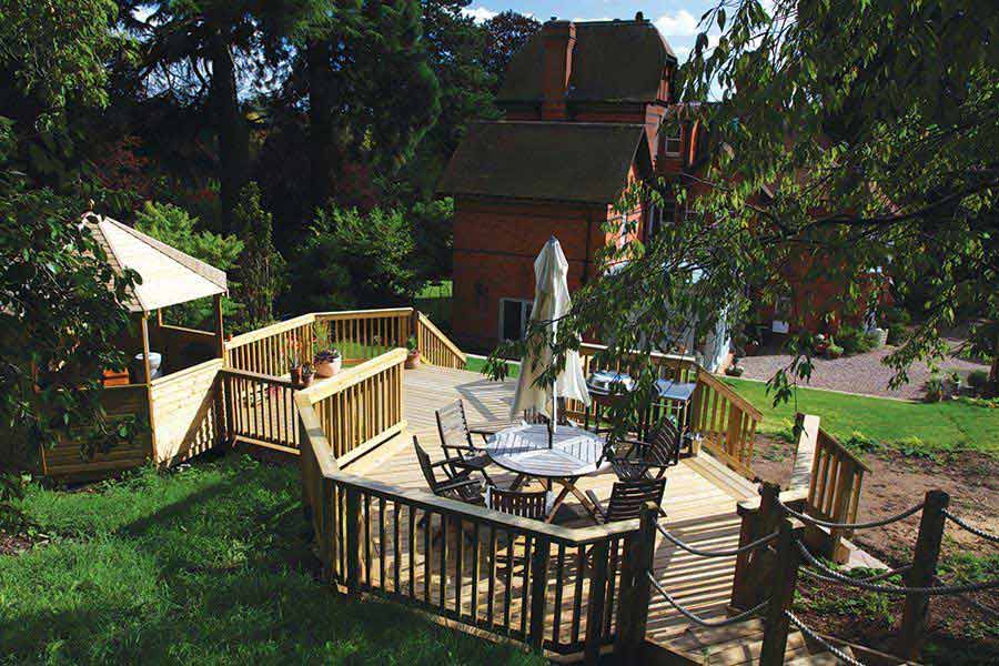 Multi-level deck reclaims space on a sloping site with decking boards