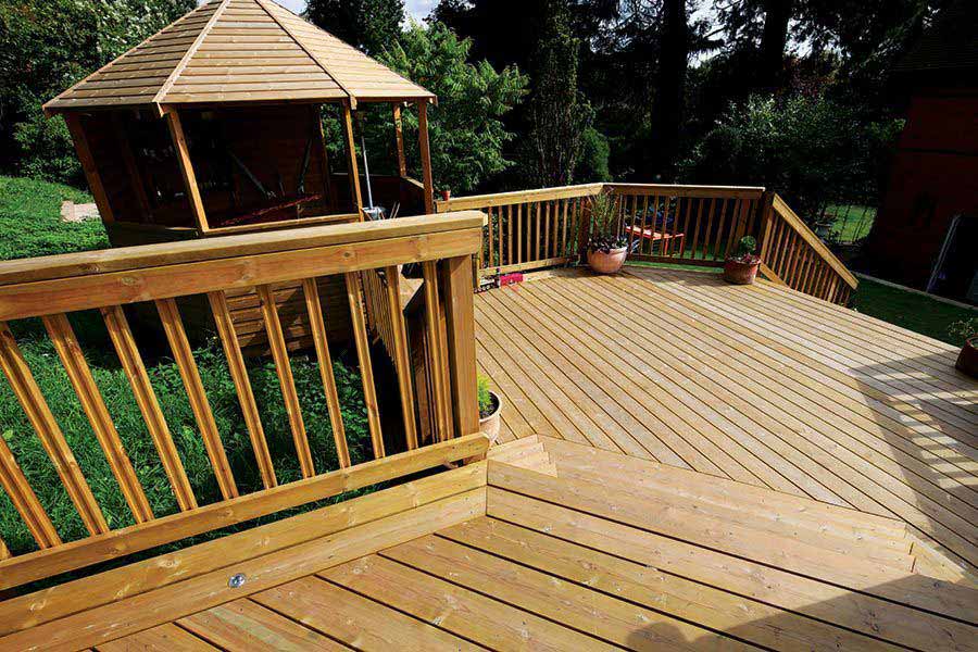 Decking on a sloping site creates more space to enjoy your garden