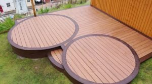 Two shades of brown Trex decking with circular design
