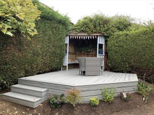 Grey Trex deck with corner timber gazebo