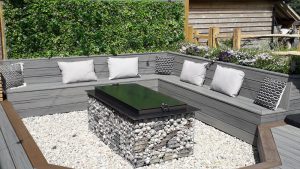 Corner seating made from grey Trex deck boards