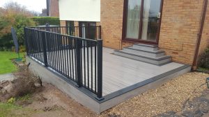 Trex deck with Aluminium railing outside of a rear house door