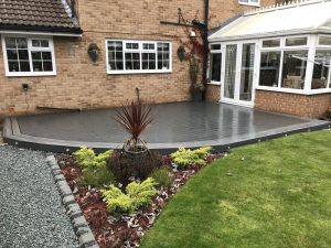 Grey Trex deck outside conservatory