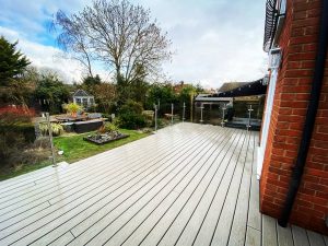 Trex Island Mist decking with clear glass railings