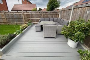 Corner Trex deck in grey with corner sofa