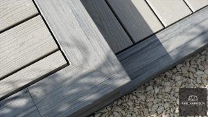 Close-up of grey Trex deck of two levels