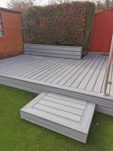 Grey Trex deck with hedge