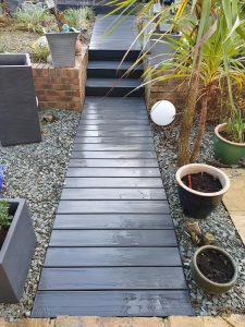Path area made from grey Trex deck boards