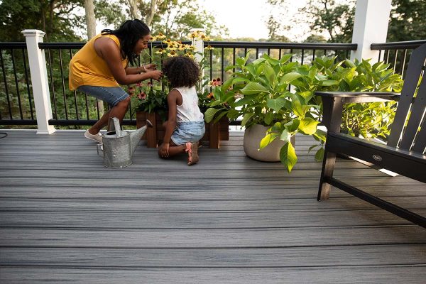 Mother and child gardening on Trex composite decking
